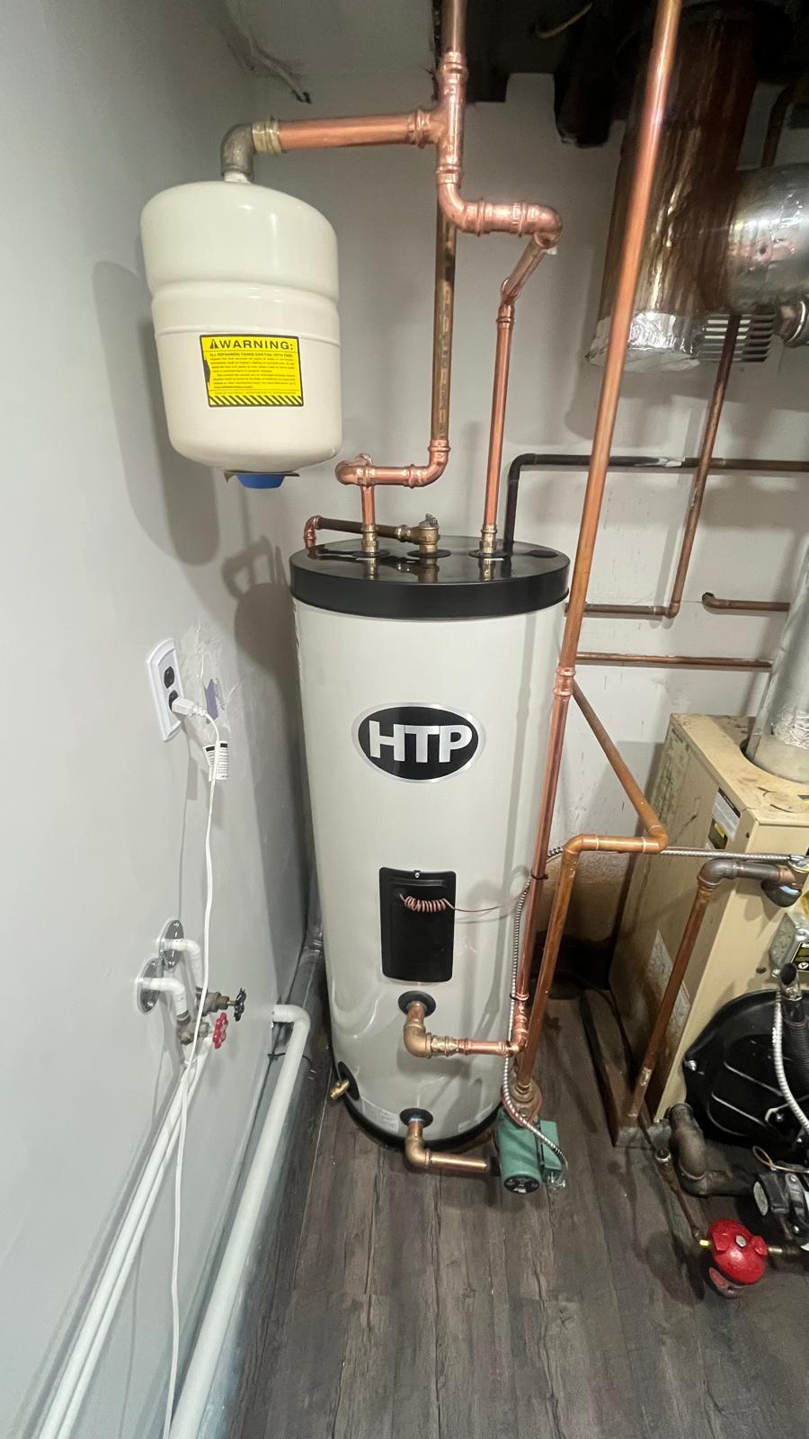 HTP water heater with expansion tank and copper piping